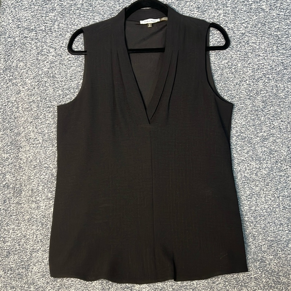 Calvin Klein Black Sleeveless V-neck blouse: size M; worn twice.
